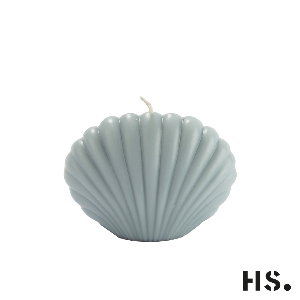 Dekorative Kerze hellblau in Muscheloptik Dekorative Kerze hellblau in Muscheloptik